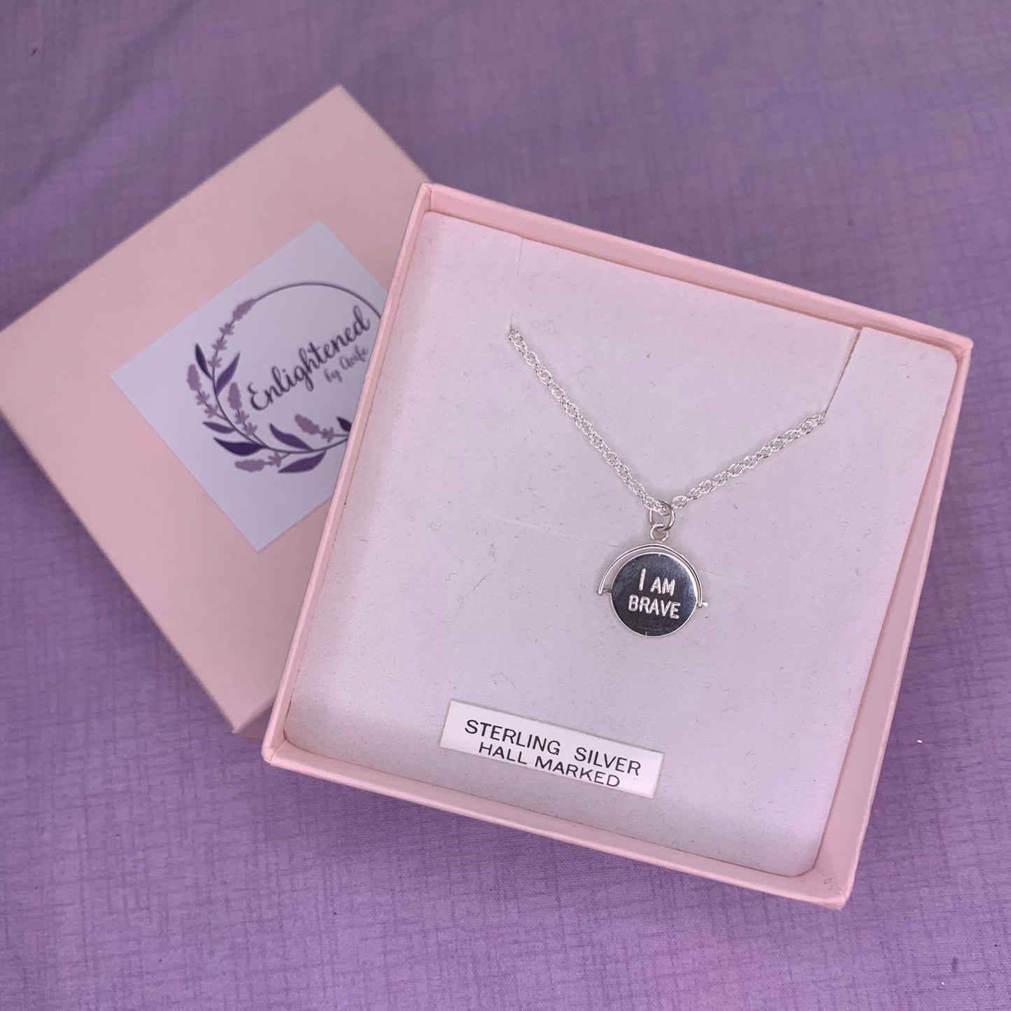 Sterling silver brave affirmation spinner necklace. A thoughtful gift of a spinner pendant allows those with sensory issues, anxiety, ADHD, autism is a meaningful gift for ourselves or as a mental health gift to remind those dearest to us that they are brave