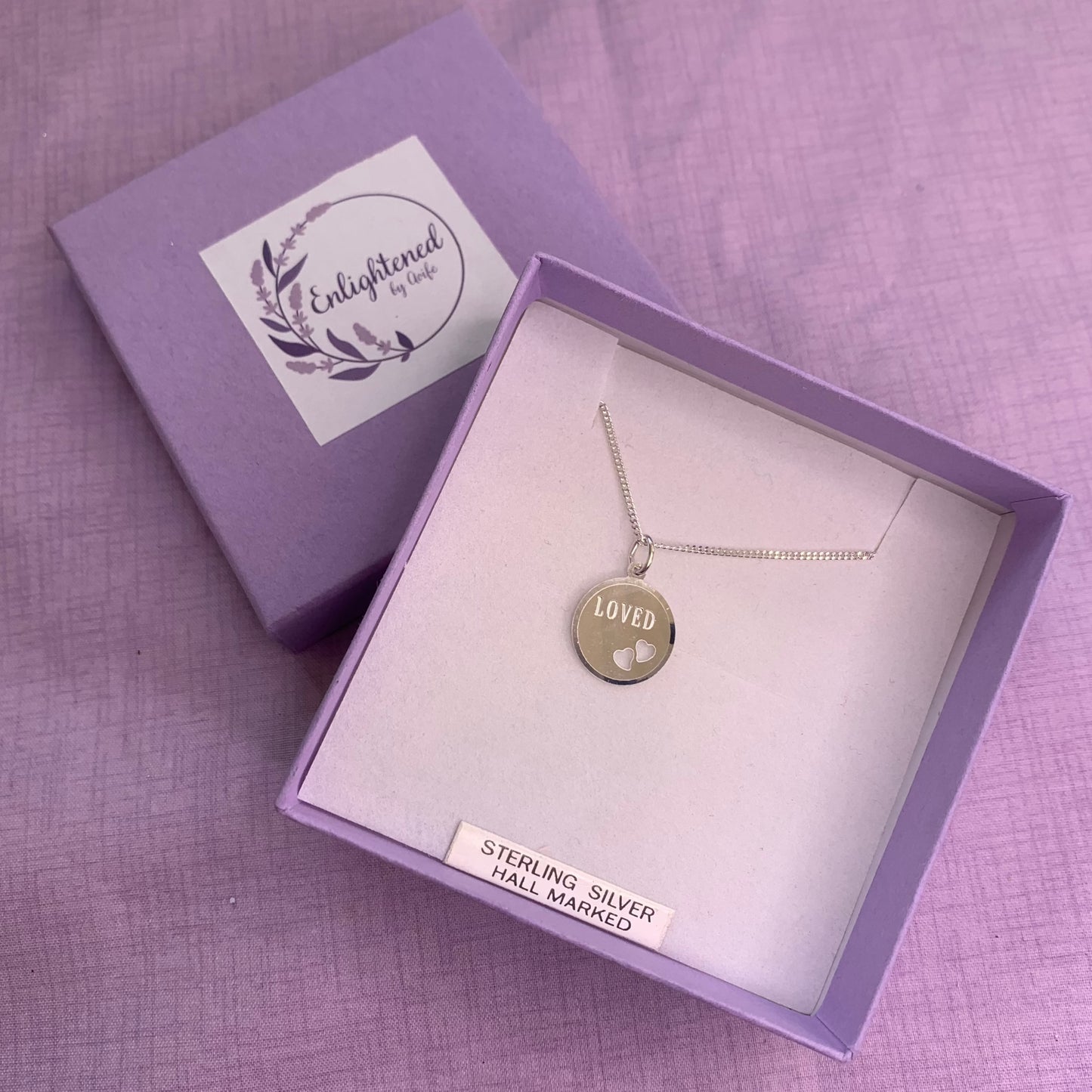 Sterling silver loved affirmation necklace. Disc pendant with heart design is a meaningful gift for ourselves or as a mental health gift to remind those dearest to us that they are loved